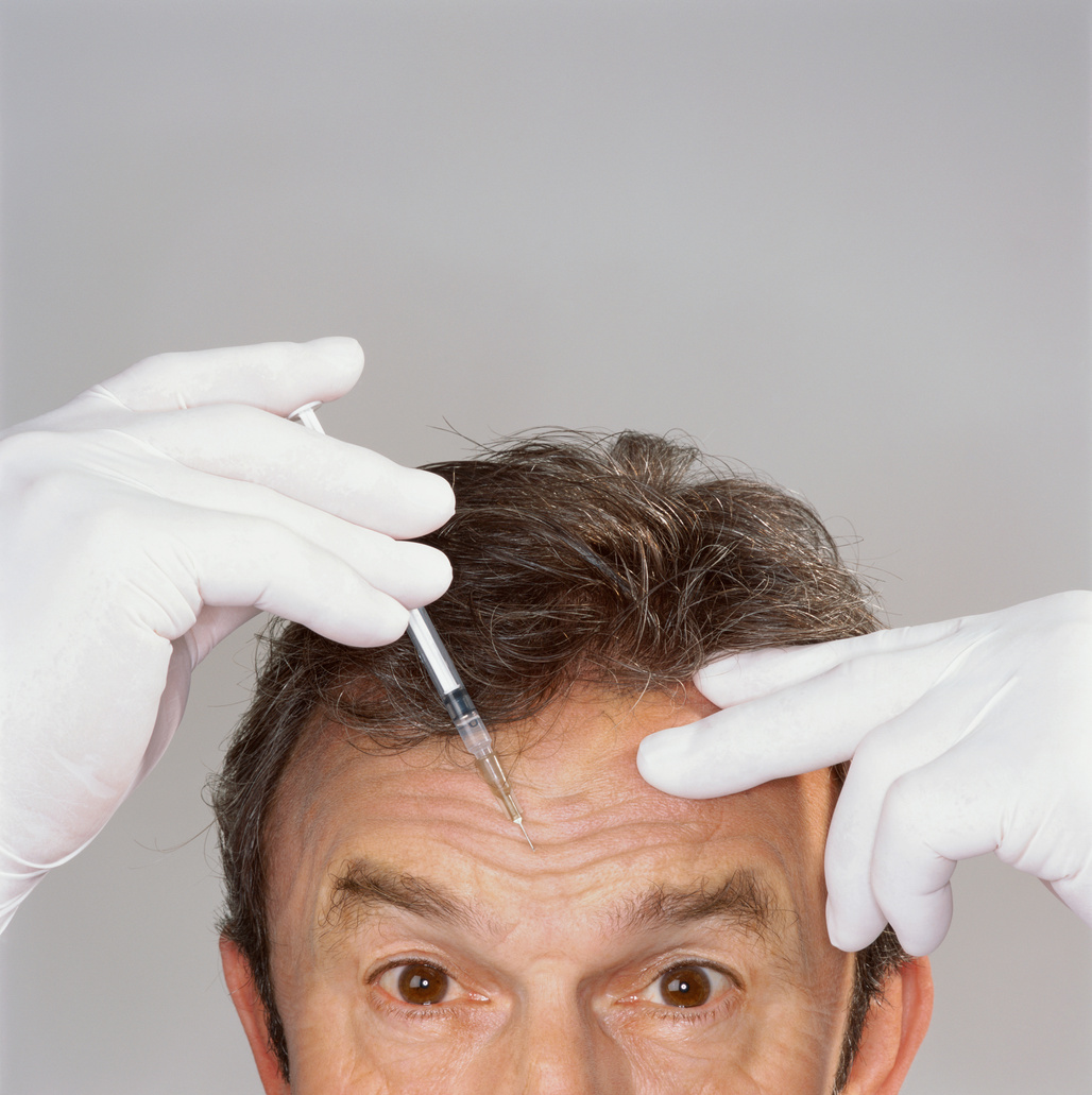 close up view of a man received a botox injection