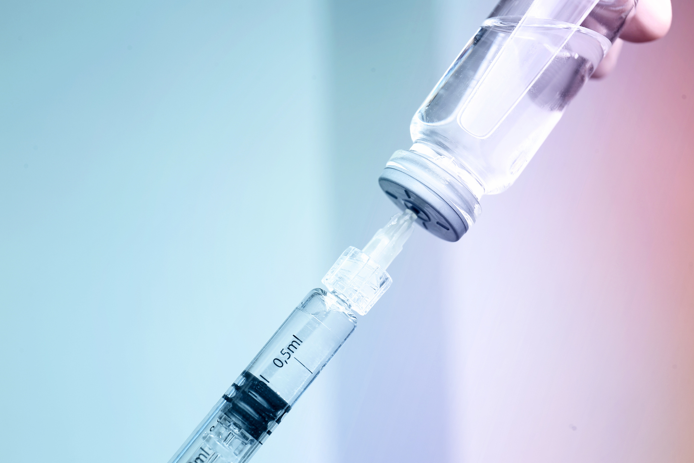Syringe with Filler for Cosmetology and Ampule on Light Background, Closeup